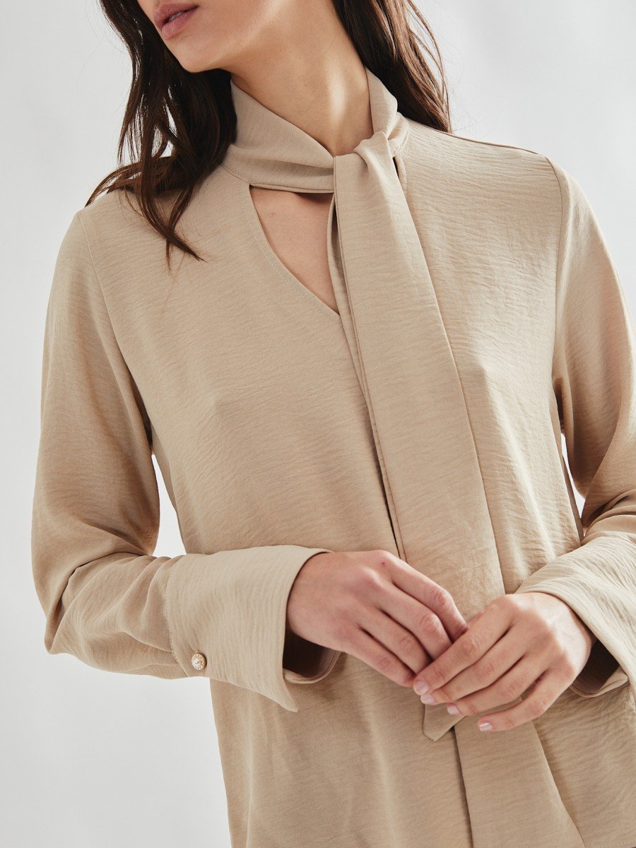 BLUSA MANGA LARGA CON LAZO