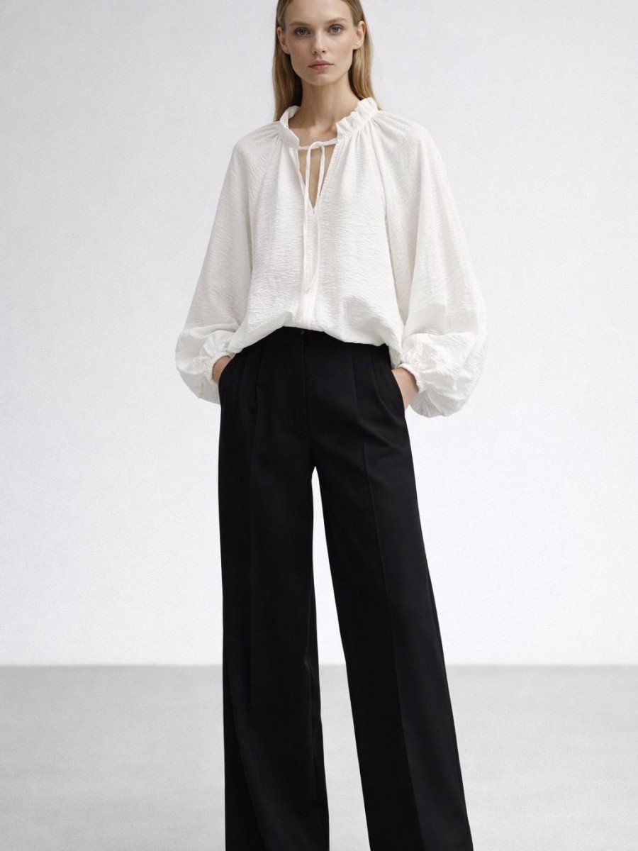 BLUSA MANGA ABUCHONADA