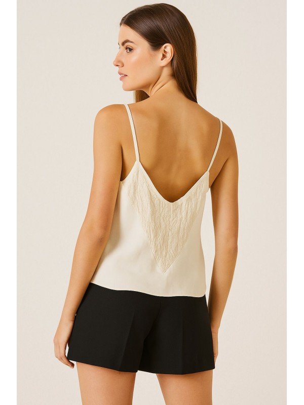 BLUSA CON BRETELES