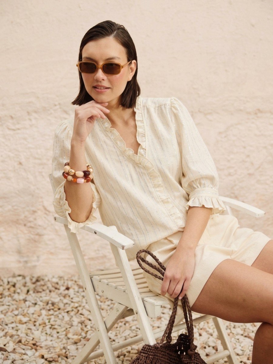 BLUSA CON RAYAS BORDADAS